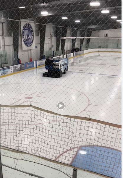 Stamford Twin Rinks ice - Grit Kore View of the ice through the netting at Stamford Twin Rinks during a resurface